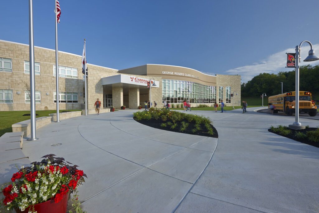high school building exterior entrance|high school rooftop garden space|high school cafeteria students|high school library seating|outdoor learning high school social staircase|high school auditorium|school building exterior walkway||||||||||||