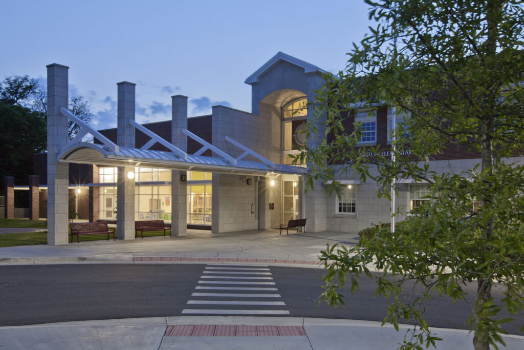 school exterior building|elementary students in art class|elementary students in cafeteria eating|young students gathered in library|elementary students in hallway walking|elementary students school cafeteria||||||||||