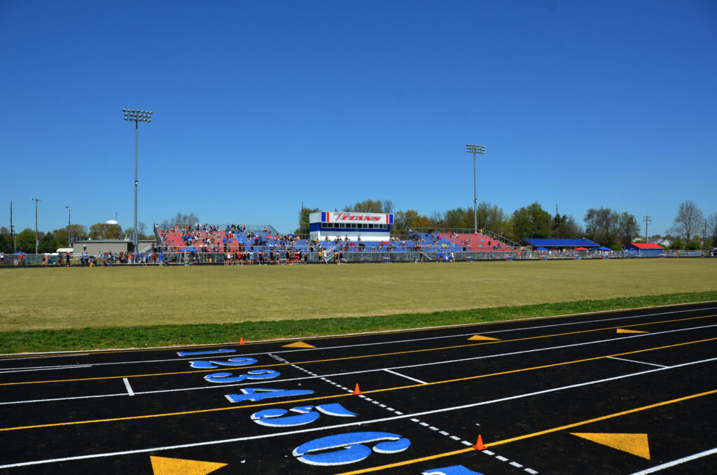 high school track and field fans bleachers|high school sporting event fans in bleachers|high school track and field|high school track and field athletes|high school football field and track|high school football field and track||||||||||
