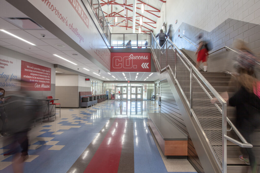 high school hallway and staircase|high school gymnasium students activities|high school cafeteria seating|high school hallway students walking|high school hallway students walking|high school student gathering socialize|high school exterior building|student learning healthcare|high school students learning|high school auditorium|high school building exterior view||||||||||||||||||||