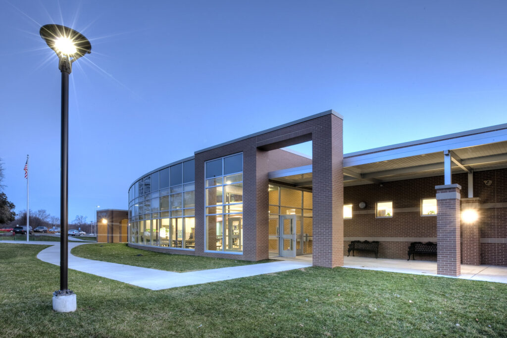 school exterior|education building library|student learning music room children playing|student learning environment classroom|education building school library with books|school cafeteria seating and empty no students|school exterior in the evening||||||||||||