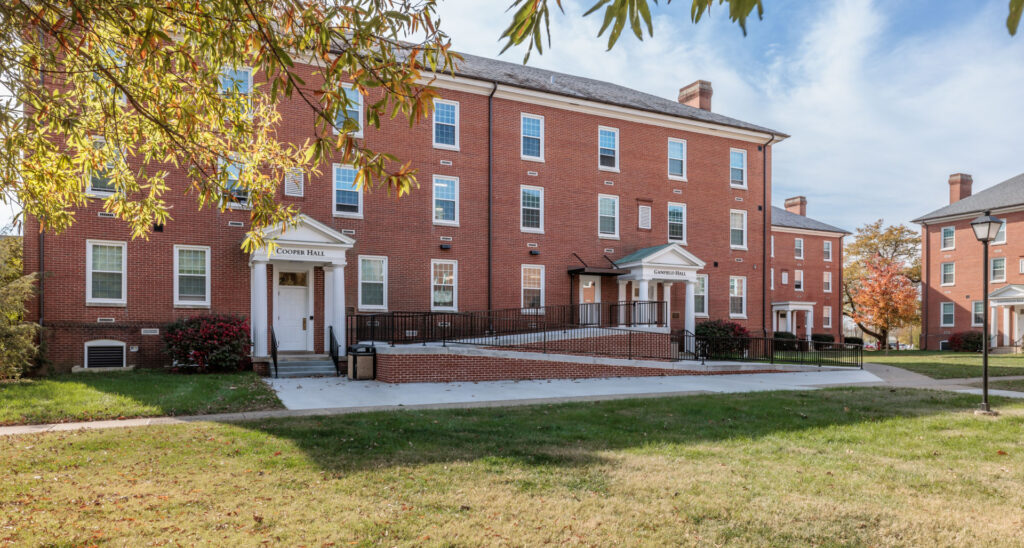 higher education building exterior|building exterior|lobby area with sofa seating|eating area with high and low seating|kitchen area with high and low seating|gathering space with bright color sofas|college dorm room beds|bathroom with light accents|exercise room with equiptment|living gathering space with sofa chairs||||||||||||||||||