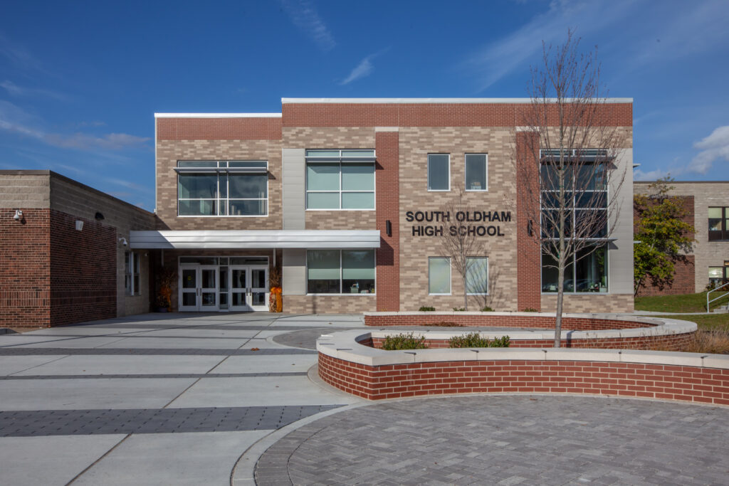 high school exterior building|outside office lobby seating waiting area|education office space|school building trophy case|school front desk welcoming|high school building exterior||||||||||
