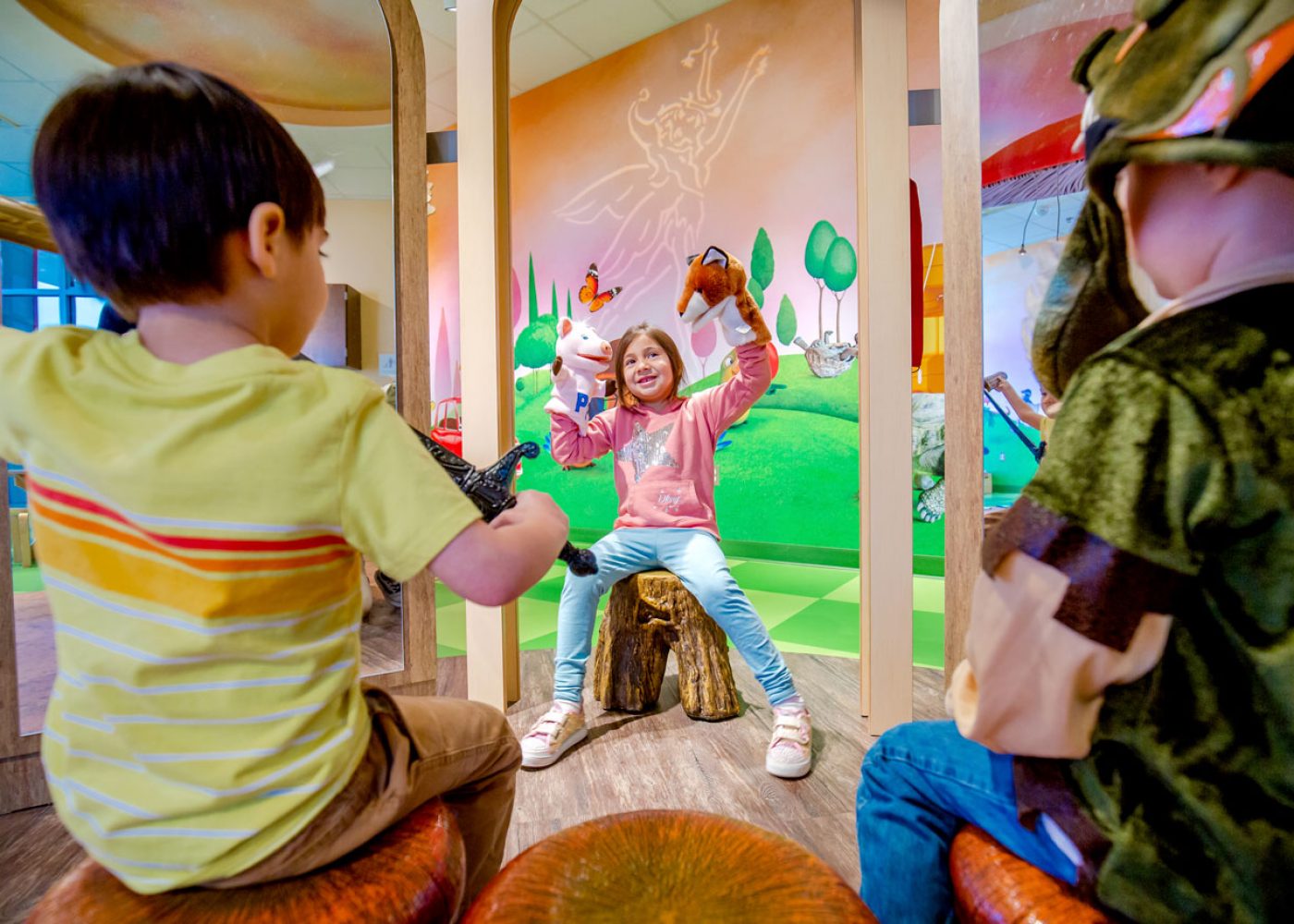 Students playing at an Early Learning Center designed by Huckabee Architects