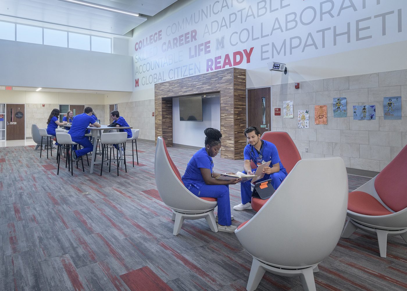 Medical students in a high school career and technology facility designed by Huckabee Architects