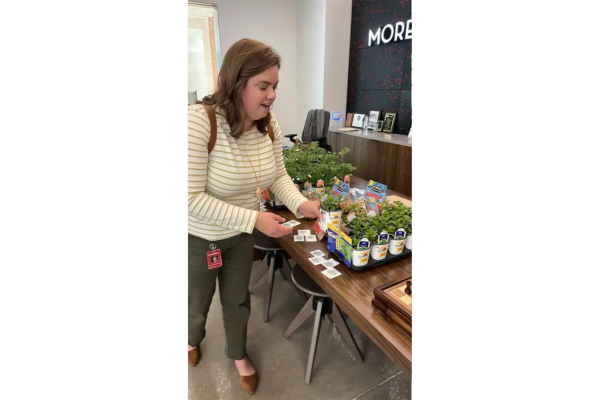 Houston office Earth Day girl with plants resize