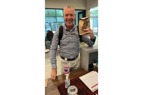 Houston office Earth Day guy with bookmark resize