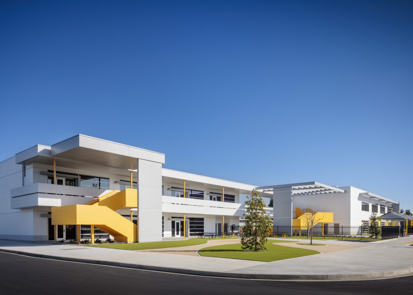 New middle school classroom building on the campus of Stauffer Middle School in Downey, California designed by Huckabee.