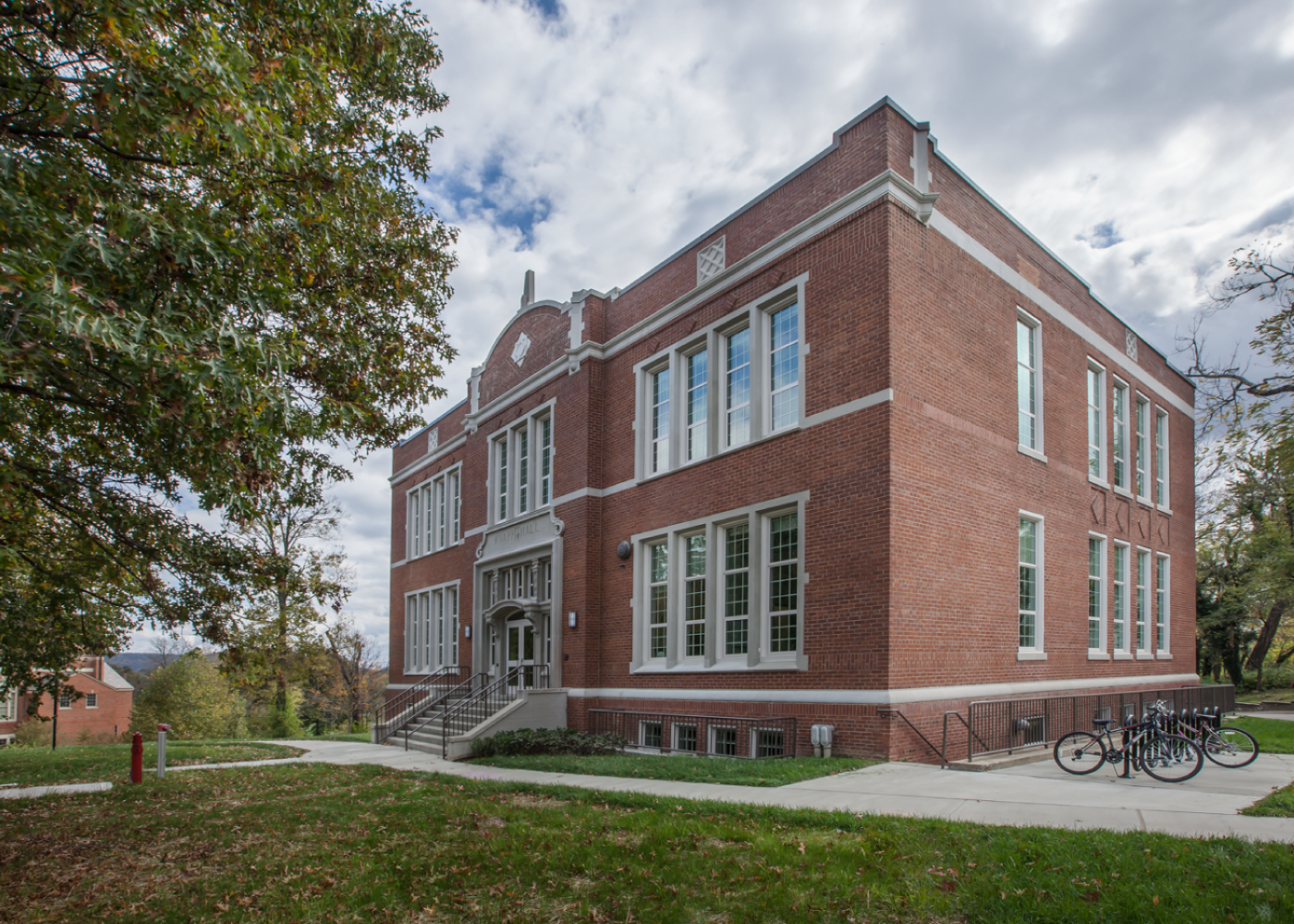 higher education building exterior view|kitchen space with barstools|college student library sofa chairs|college student collaboration classroom space|college student outdoor study space|college student collaboration classroom space|outdoor building exterior view||||||||||||