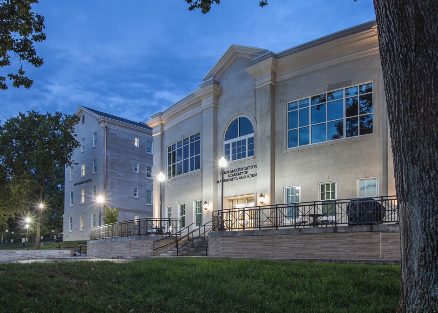 higher education building exterior|college campus dorm residence hall|higher education hallway with piano and seating|higher education large room with round tables||||||