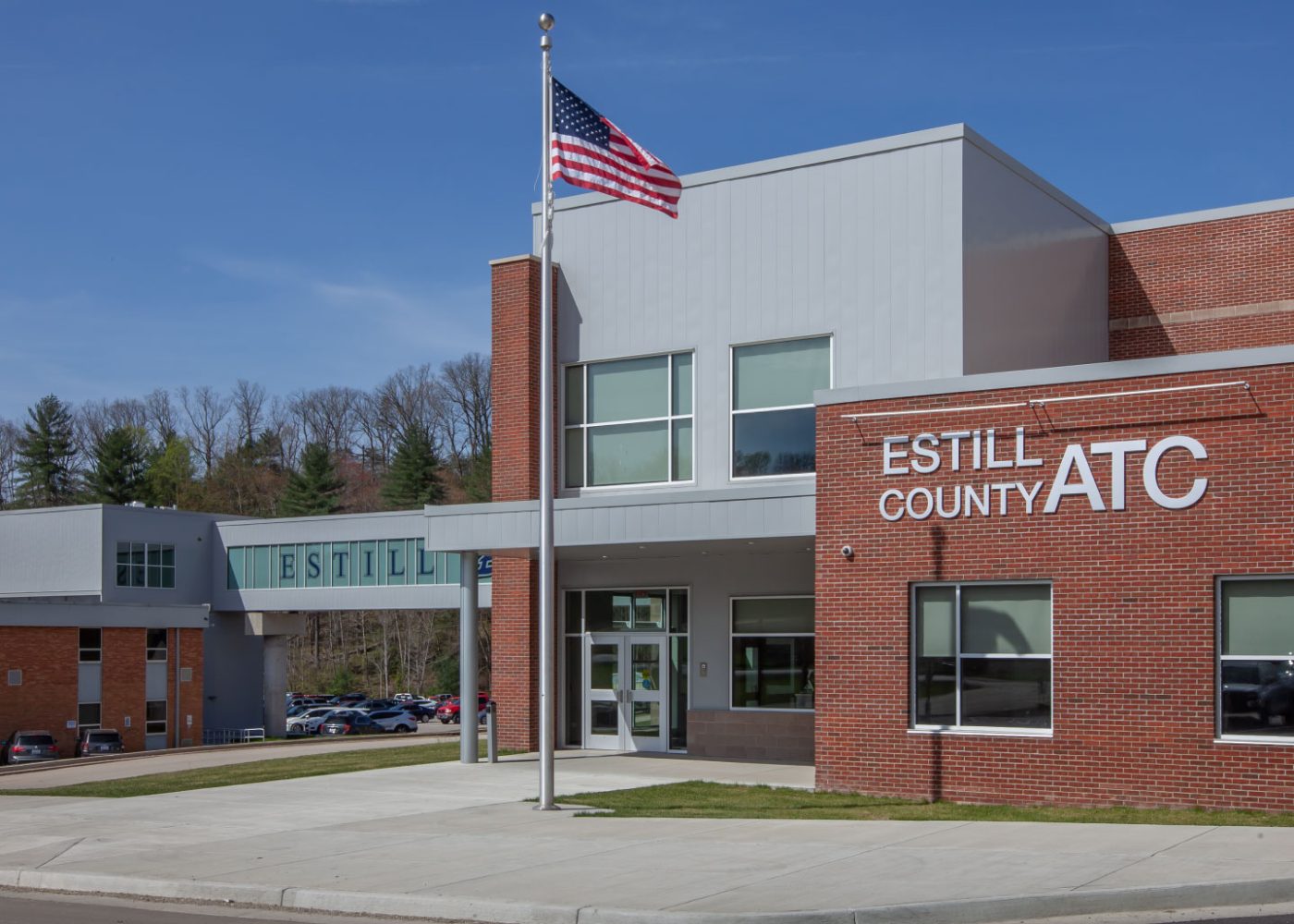 school building exterior view|school building exterior view|students walking through hallway|student walking down stairs in school|long hallway with large windows|long hallway with large windows|students learning healthcare|students working together in technology class|students working together in school|students working together in school|high school students learning building||||||||||||||||||||