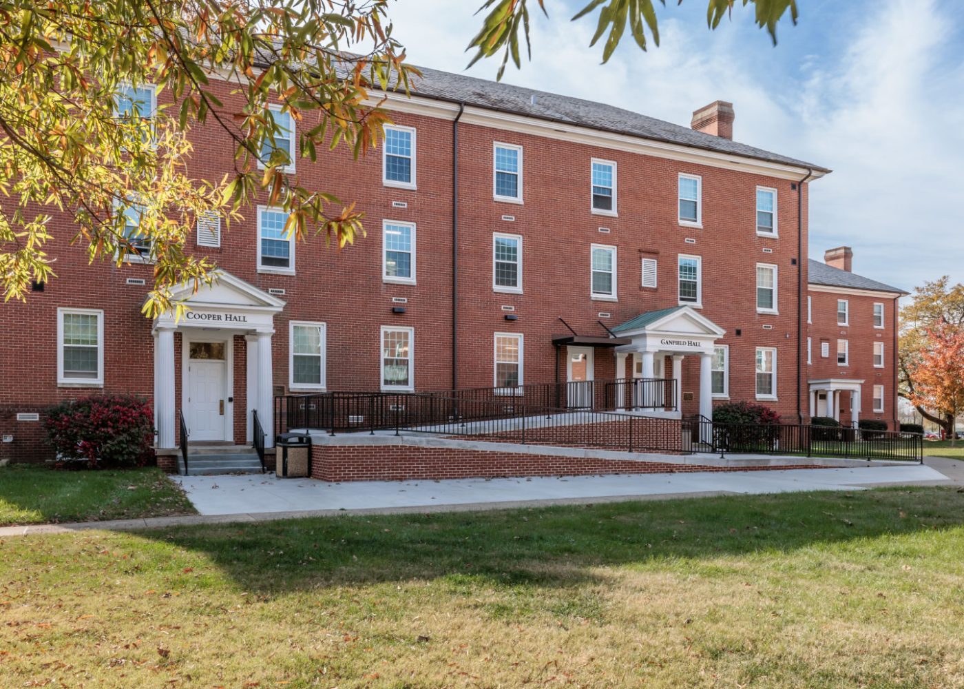 higher education building exterior|building exterior|lobby area with sofa seating|eating area with high and low seating|kitchen area with high and low seating|gathering space with bright color sofas|college dorm room beds|bathroom with light accents|exercise room with equiptment|living gathering space with sofa chairs||||||||||||||||||