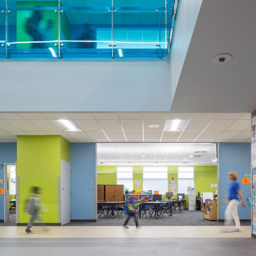 At Ullom Elementary School in Las Vegas, NV, many of the classrooms feature garage doors. Here we see the garage doors open in the morning as students arrive.